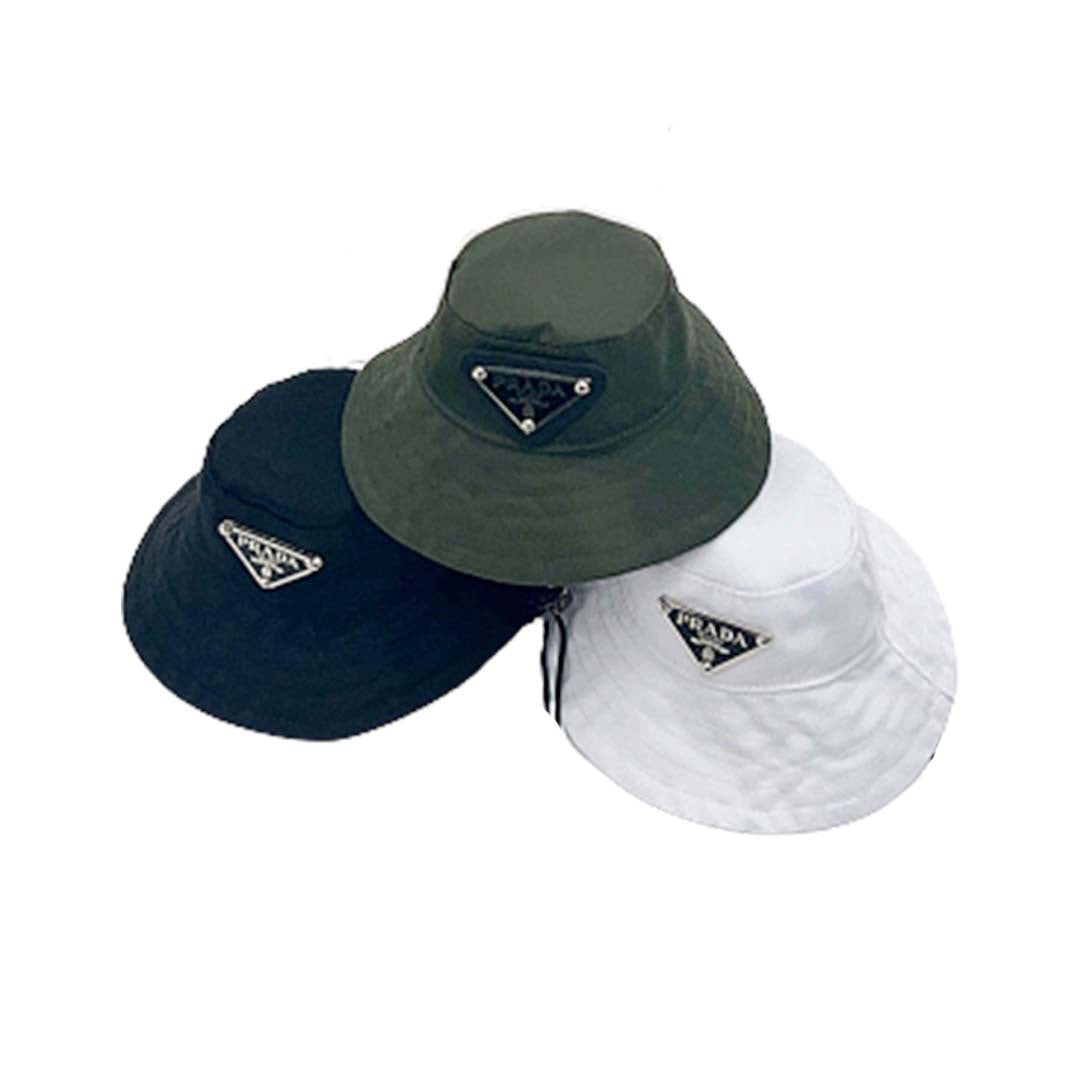 Three Pawda triangle logo bucket hats in black green and white colorways