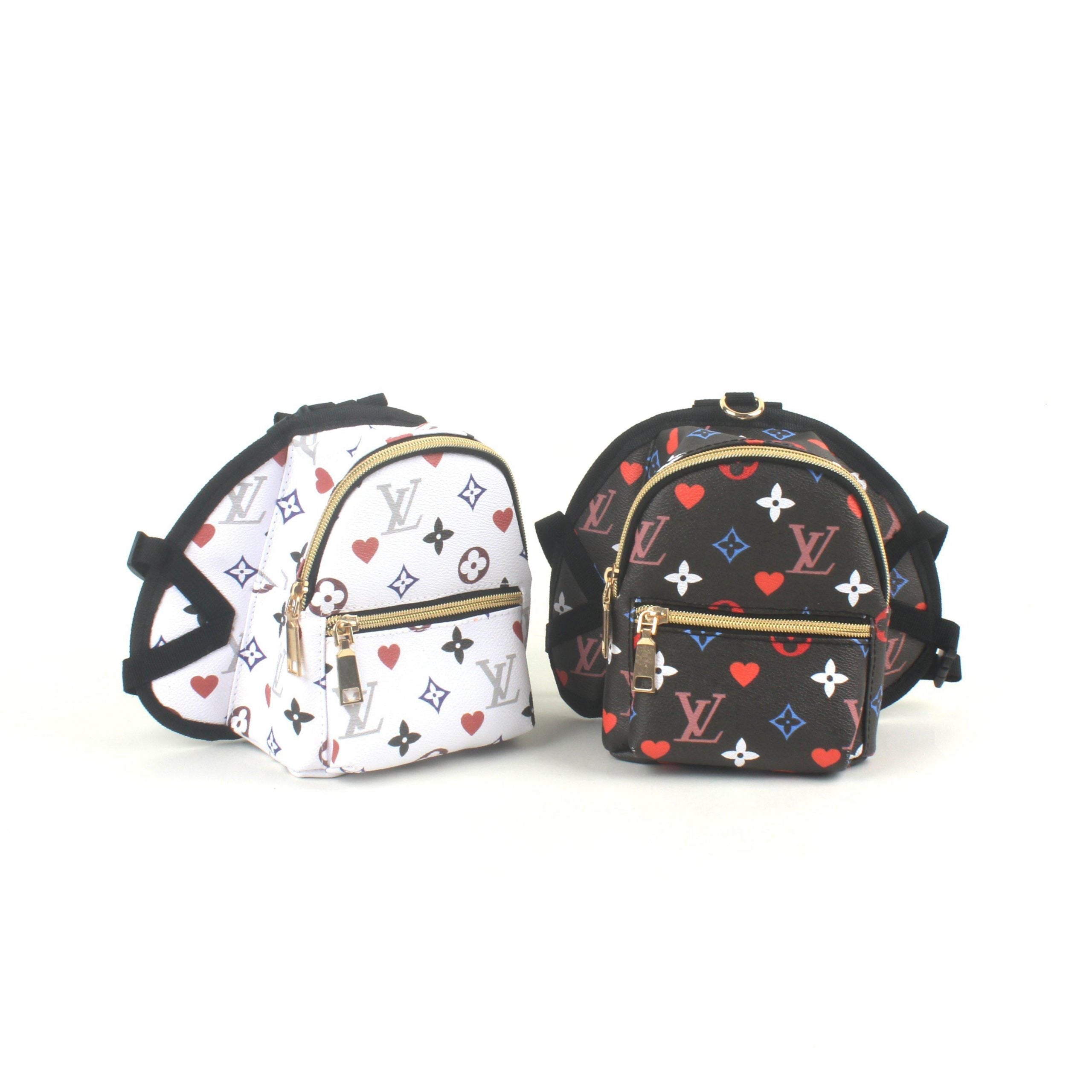 Chewy V Multicolor Backpack Hype Pups designer dog clothes.