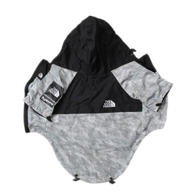 Snow camo and black dog windbreaker with Supreme North Face styling and chest panel design